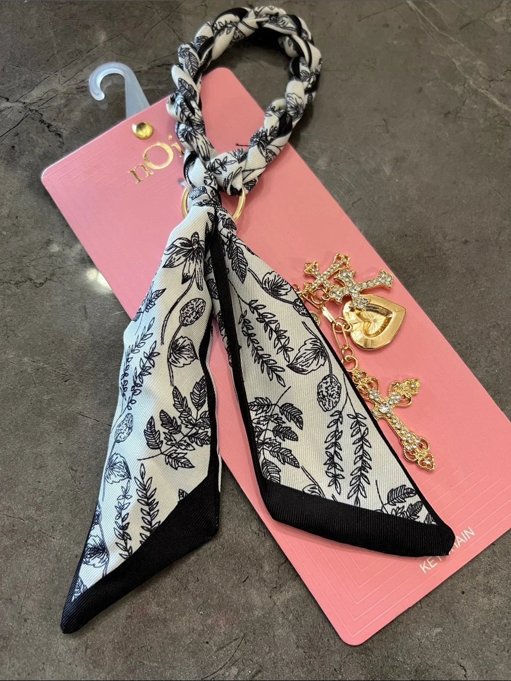 nOir Jewelry Black & White Braided Scarf Keychain with Gold Charms
